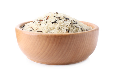 Mix of brown and polished rice in wooden bowl isolated on white
