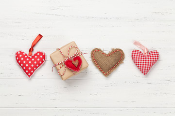 Valentines day card with hearts and gift box