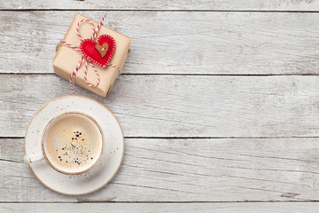 Valentines day card with gift and coffee cup