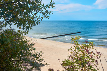 Fototapeta na wymiar Sandy beach at the Baltic Sea coast near Rewal in Poland