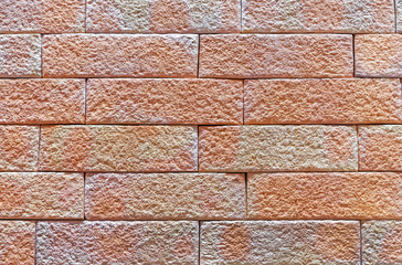 Brick wall of beige bricks. Background and texture of brickwork.