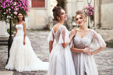 Beautiful bride and bridesmaids in gorgeous elegant stylish light grey silver floor length dresses...