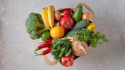 A grocery bag full of organic products. Top view, eco friendly shop.