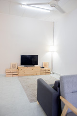 Kuala Lumpur, Malaysia - January 7, 2020 : A beautiful deco home living with sofa, tv and table coffee. Minimalist is the best choice to deco home.