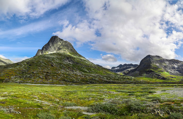 Stone peaks among the mossy landscape of Alnesvatnet Norway