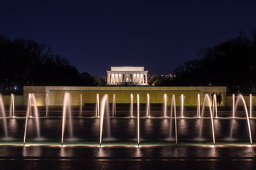 Lincoln Memorial and World War II Memorial Fountain Illuminated at Night in Washington DC