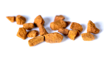 Scattered instant coffee on a white background, energetic drink