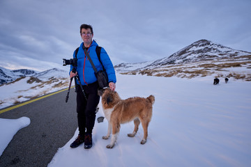 Man and his dog in the snow