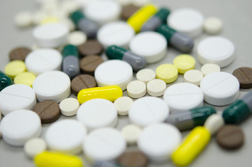 A handful of pills, capsules close-up. Medical preparation, vitamins. Treatment.