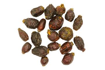Rosehip fruit, dried fruit close-up, isolated on a white background. Healthy food, vegetarianism.