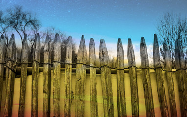 wooden fence and blue sky