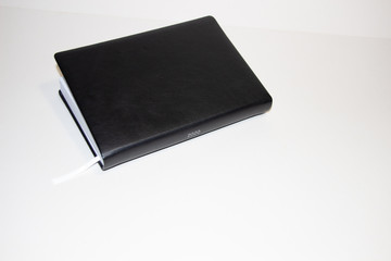 Paper black  daily planner on 2020 year on white background