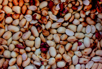 Roasted peanuts closeup. Peeled roasted peanuts, visas on top, for background