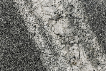 Diagonal line on a dark stone grey texture, marble or granite background