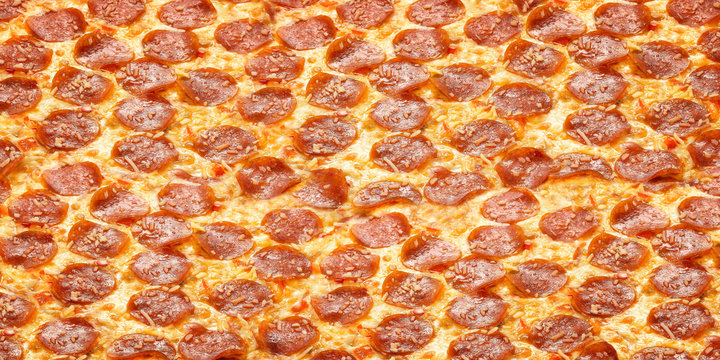 Texture pizza pepperoni. Seamless food wallpaper pizza for your design and print in posters and menu pizzeria, for cafe or restaurant