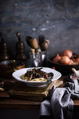 Fototapeta na wymiar Wine and mushroom sauce pasta..style rustic