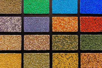 Color samples of building materials in squares, collage, texture of drywall, a collection for the design and decoration of interior close-up