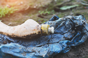 environmental pollution, ecological problem, spilled plastic garbage on the ground, waste, land and water pollution