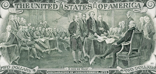 Signing declaration of independence at 4 of July 1776 on US two dollar bill. United States dollar close up.
