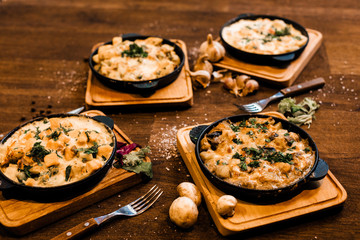 Baked potatoes with cheese.