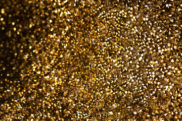 Abstract gold crystal on background. Glittering background.