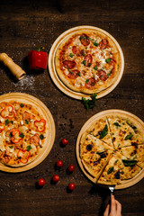 Delicious Italian pizza lies on the table.