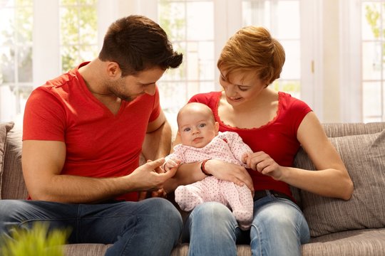 Young couple with baby girl
