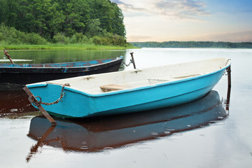 Naklejka na ściany i meble Boats On The Lake. Morning nature before fishing