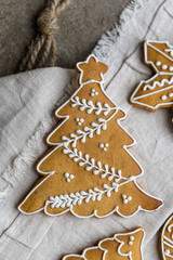 Glaze gingerbread Christmas tree on concrete background