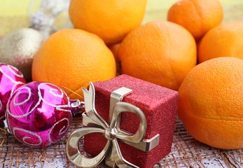 Oranges and tangerines amid Christmas toys ahead of new year