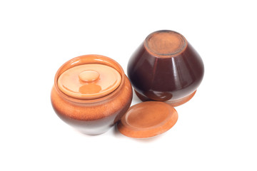 brown ceramic pots on white isolated background