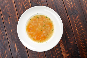 vegetable soup in the white bowl