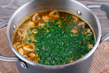 Cooking Soup. Fresh greens in a pan