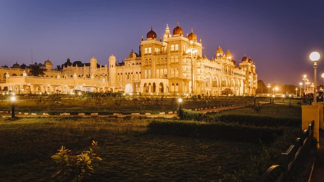 India, Karnataka, Mysore, City Palace, illuminated at dusk - time lapse