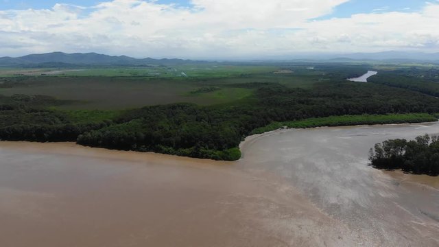 Aerial shot of river Tempisque and Bebeder river mouth, shot at Puente de La Amistad de Taiw&aacute;n (Taiwan friendship bridge). Guanacaste, Costa Rica.