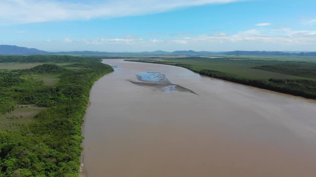 Aerial shot of river Tempisque and Palo Verde National Park, flying backwards, shot at Puente de La Amistad de Taiw&aacute;n (Taiwan friendship bridge). Guanacaste, Costa Rica.