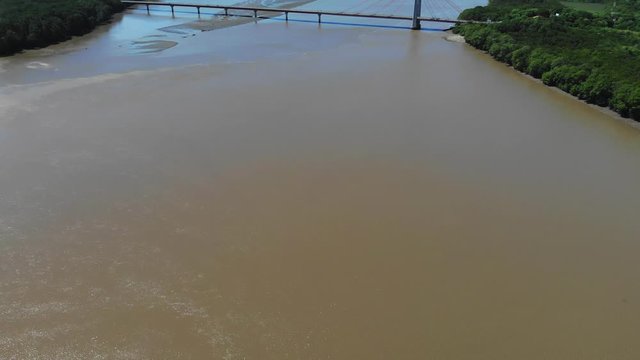 Aerial shot of river Tempisque and Puente de La Amistad de Taiw&aacute;n (Taiwan friendship bridge). Guanacaste, Costa Rica.