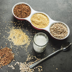 Buckwheat, pearl barley and millet on the table