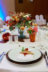 Table setting with fork, knife, plates and glass