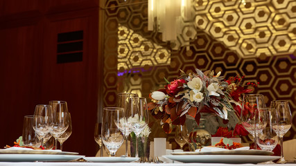catering table set service with silverware, napkin and glass at restaurant before party