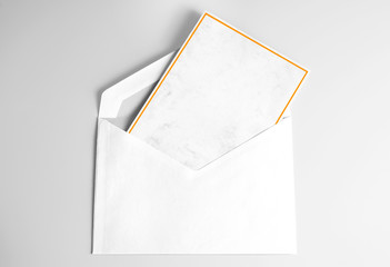 Blank Folded Greeting or Thank you Card with Golden Frame in Envelope