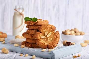 Delicious homemade crispy cookies with peanuts. Served with bottle of milk.