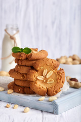 Delicious homemade crispy cookies with peanuts. Served with bottle of milk.