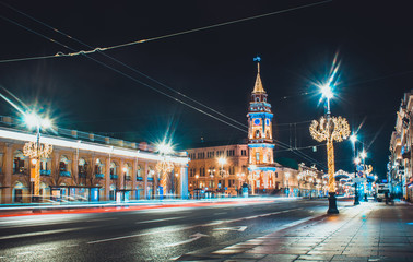 Saint Petersburg streets with Christmas illumination on Nevsky Prospect at night. New Year decorations in Russia. Empty street scenery with beautiful buildings