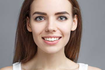 Naklejka premium closeup beautiful smiling girl