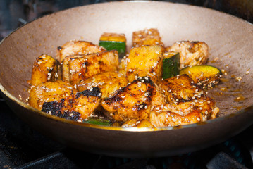 Chicken skewers fried in sesame oil, cuisine with oriental flavor in Guatemala, Central America.