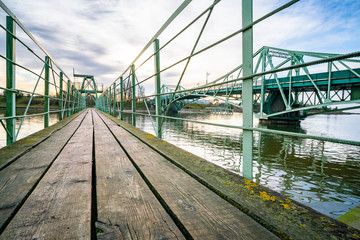 Fototapeta na wymiar Historic riveted bridge and ancillary structures.