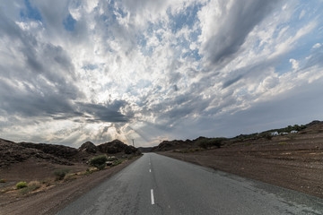 Scenic Sunset Sky and Cloudy Sky over Rocky Mountains Island