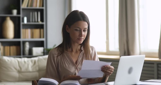 Excited lady customer open read paper letter feel overjoyed
