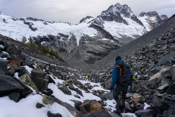 Adventurous friends are hiking in the Beautiful Canadian Mountain Landscape during cloudy morning. Taken near Chilliwack, East of Vancouver, BC, Canada.